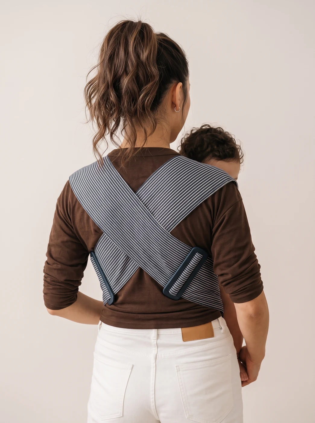 Crossed shoulder straps and adjustment buckles let you fine-tune the fit.